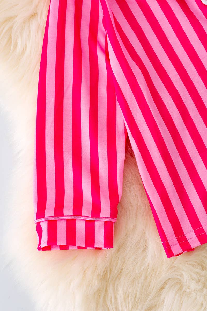 FUCHSIA STRIPE AND WHITE CHARACTER PRINTED PJS. PJG40101 WE